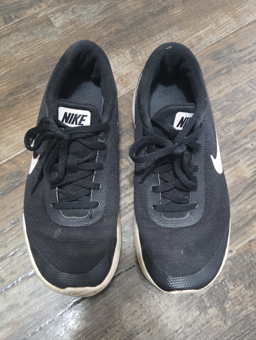 Nike Men’s Black Sneakers with White Swoosh